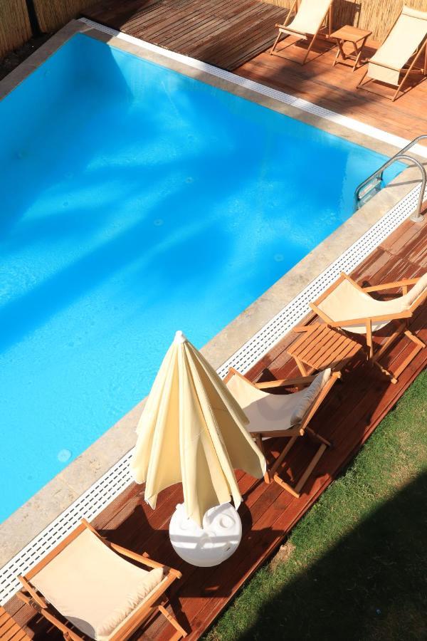 La Sorella Butik Hotel Далян Екстериор снимка