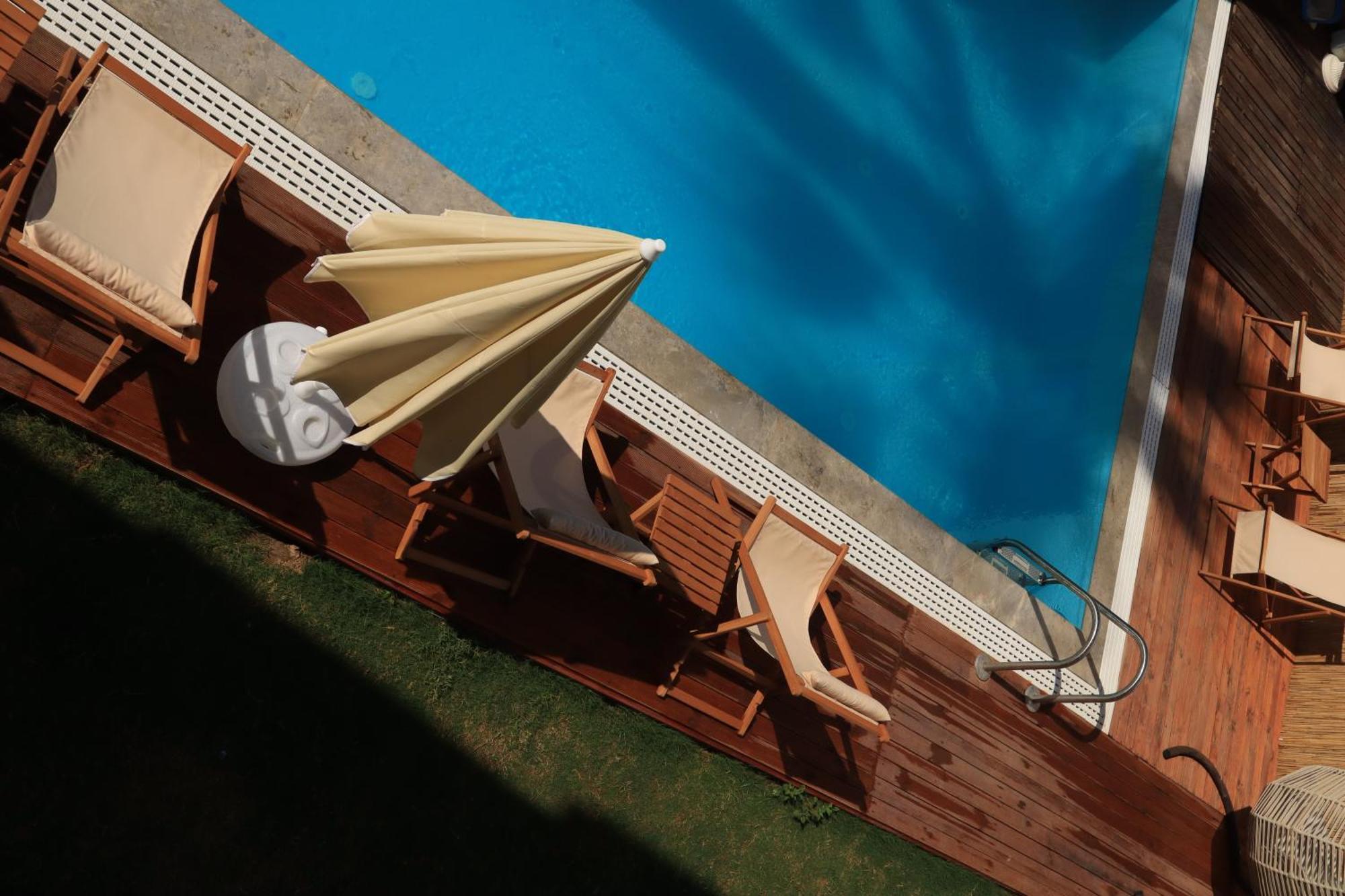 La Sorella Butik Hotel Далян Екстериор снимка
