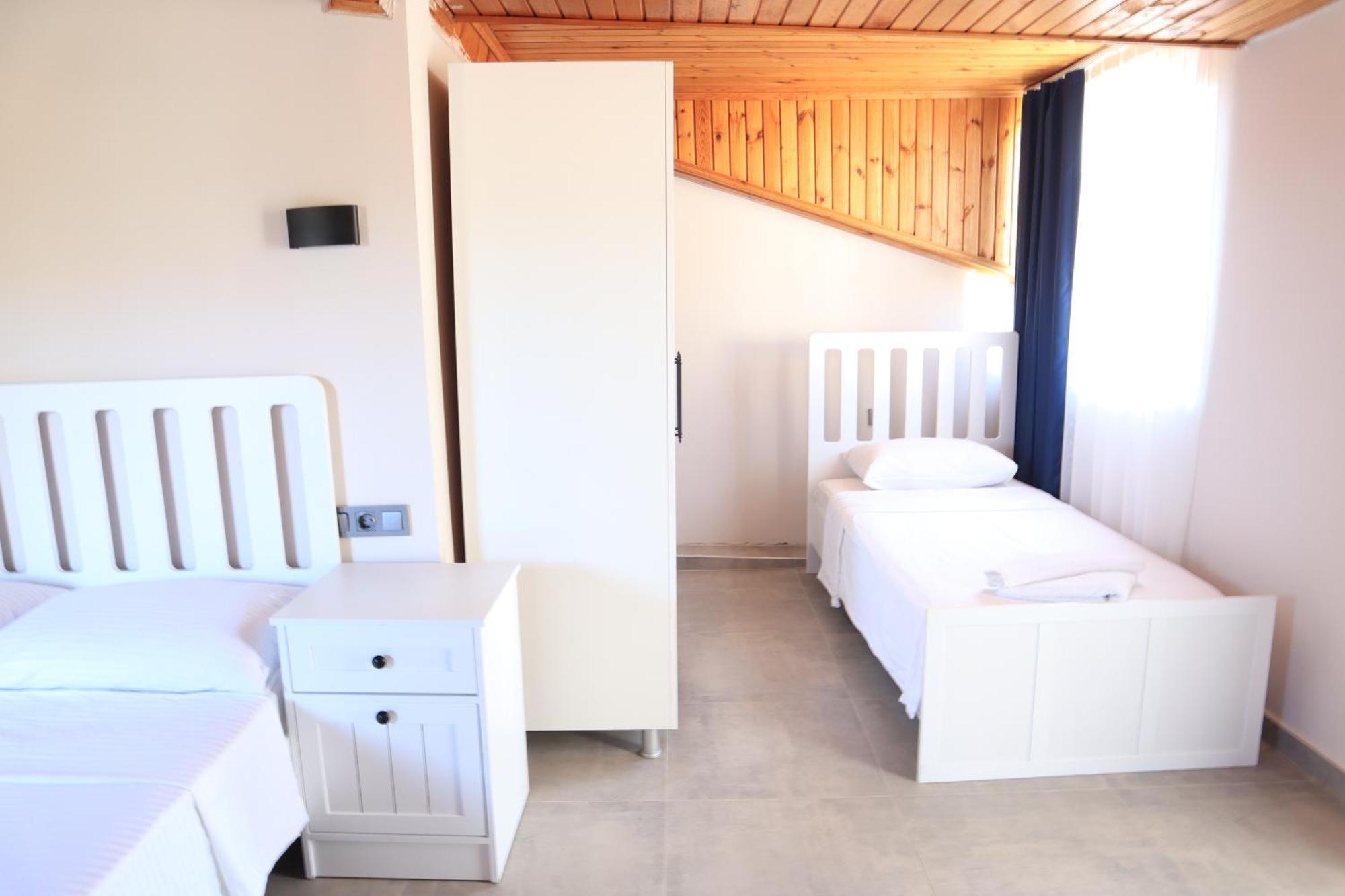 La Sorella Butik Hotel Далян Екстериор снимка