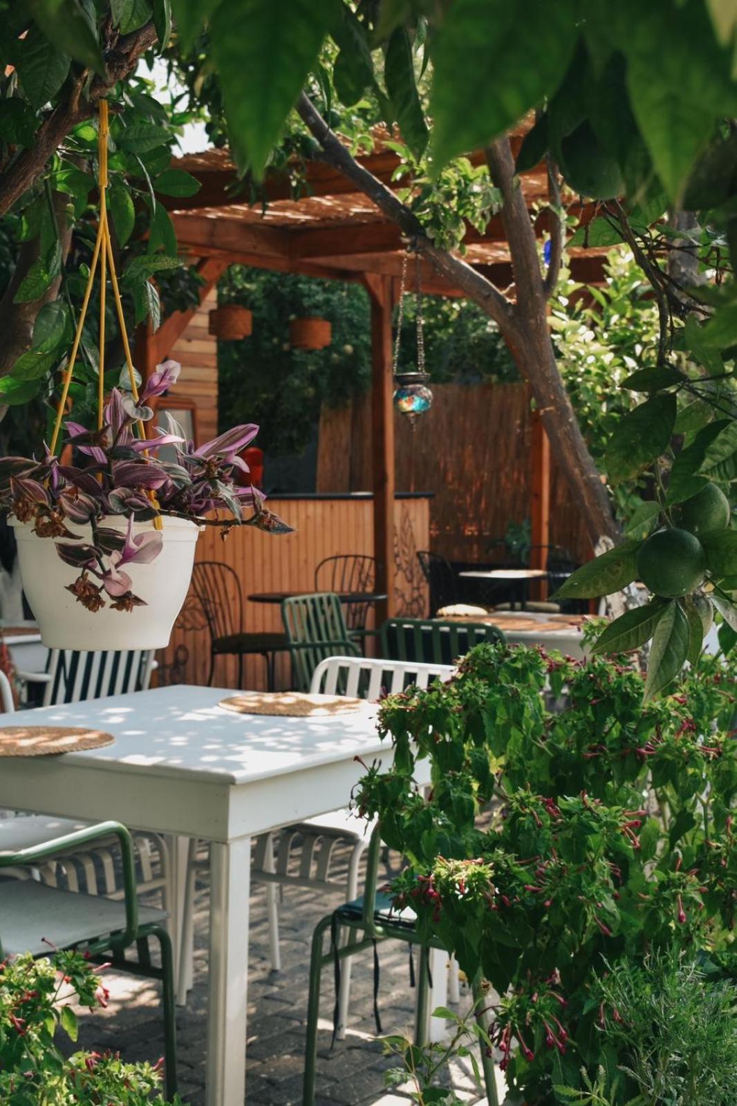La Sorella Butik Hotel Далян Екстериор снимка
